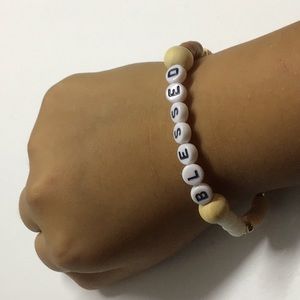 This is a neutral clay bead bracelet for kids